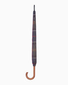 Close-up of Barbour tartan umbrella showing woven label and classic design