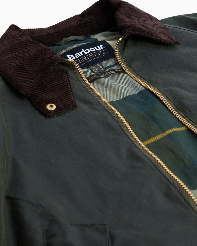 View of tartan lining inside the Barbour Arlene Wax Jacket, open to show inner design