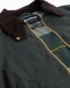 View of tartan lining inside the Barbour Arlene Wax Jacket, open to show inner design