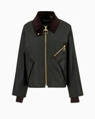Detail of welt pockets and zippered chest pocket on Barbour Arlene olive cotton jacket