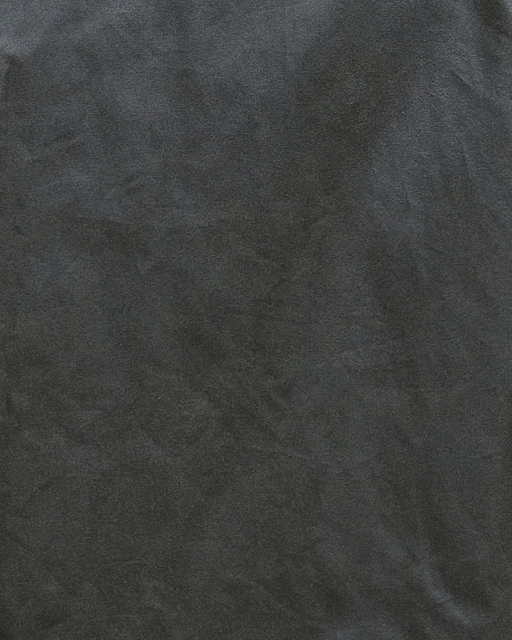 Close-up of fabric texture showing oiled cotton finish on Barbour Arlene Wax Jacket in olive