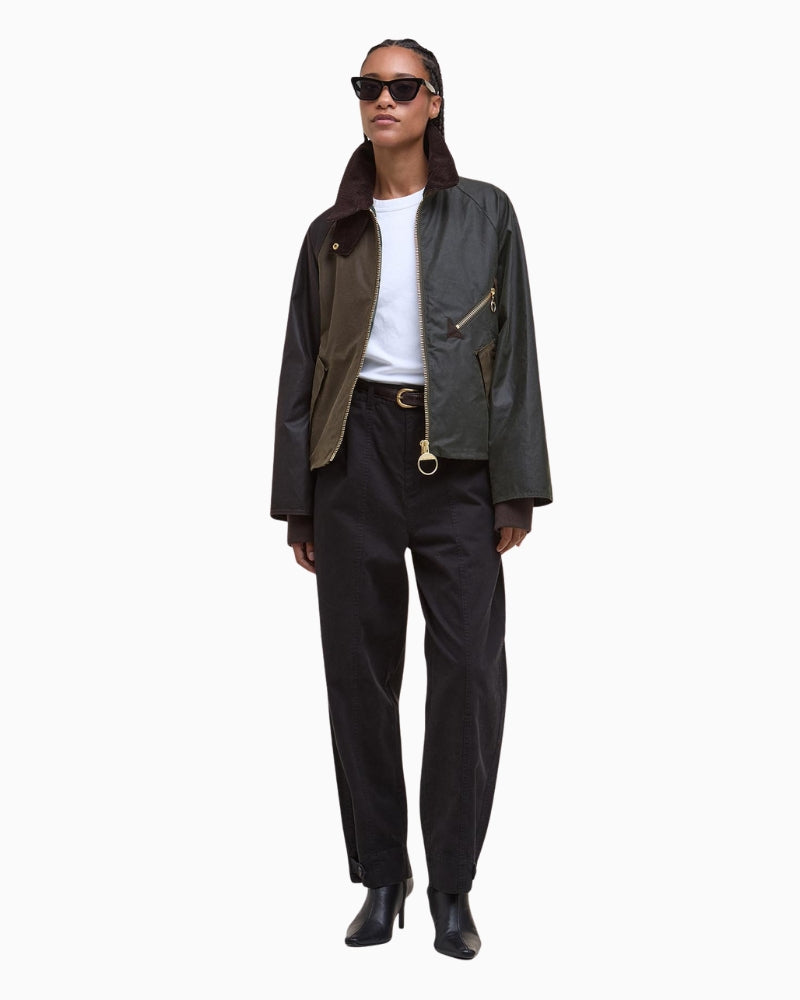 Model wearing Barbour Arlene waxed cotton jacket styled with trousers