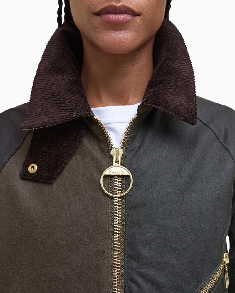 Close-up of corduroy collar and tartan lining on Barbour Arlene waxed jacket