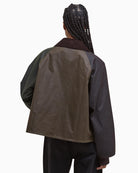 Back view of Barbour Arlene waxed cotton jacket with ribbed cuffs and cropped length