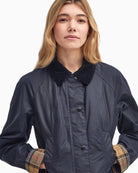 Barbour Beadnell Waxed Jacket in navy button detail