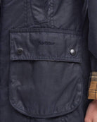 Barbour Beadnell Waxed Jacket in navy pocket detail