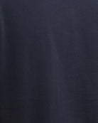Barbour Bede T-shirt navy close up view of fabric – Áines Boutique