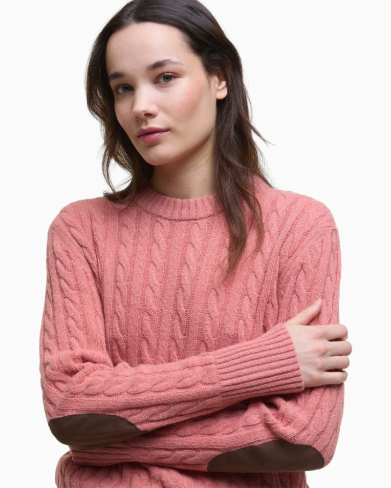 Side angle showing the cable-knit texture and fit of the jumper