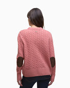 Back view of the jumper, highlighting the ribbed hem and sleeves