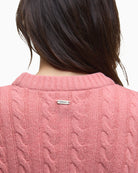 Zoomed-in view of the ribbed neckline and shoulder detail