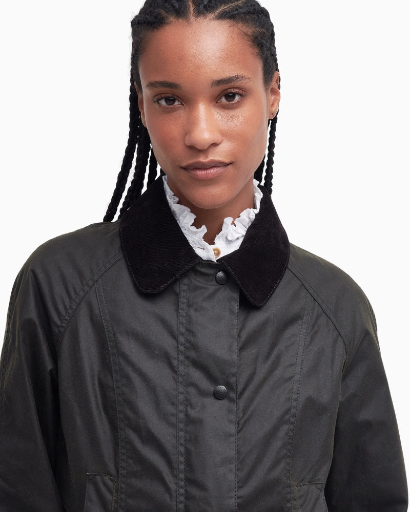 Close-up of olive corduroy collar with neck flap fastened on Barbour Beadnell