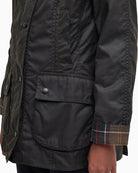 Front bellows pocket with Barbour branding on the Classic Beadnell Jacket