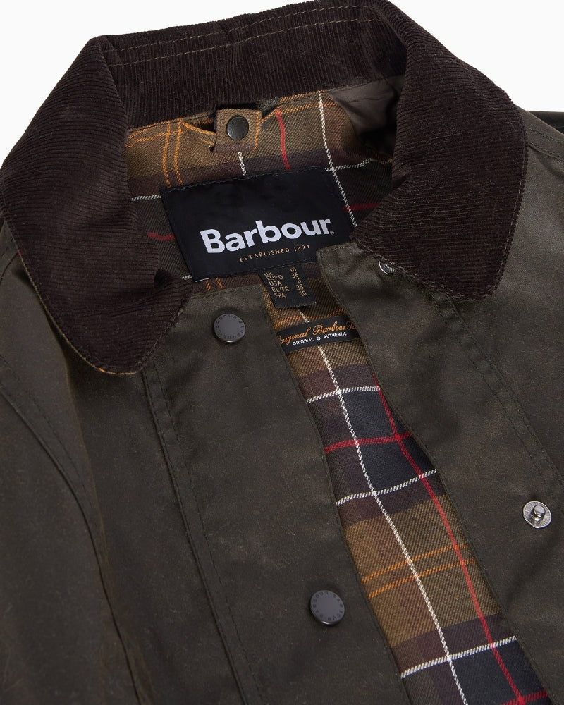 Label inside Barbour jacket with tartan design and logo