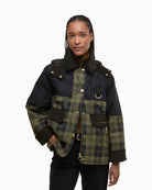 Front view of Barbour Elaine Sproof jacket in olive check with hood and popper closure