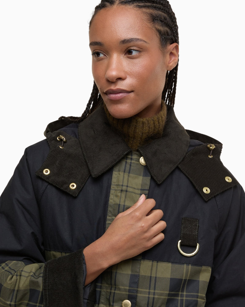 Detailed view of Barbour zip and popper fastening on the Elaine Sproof jacket