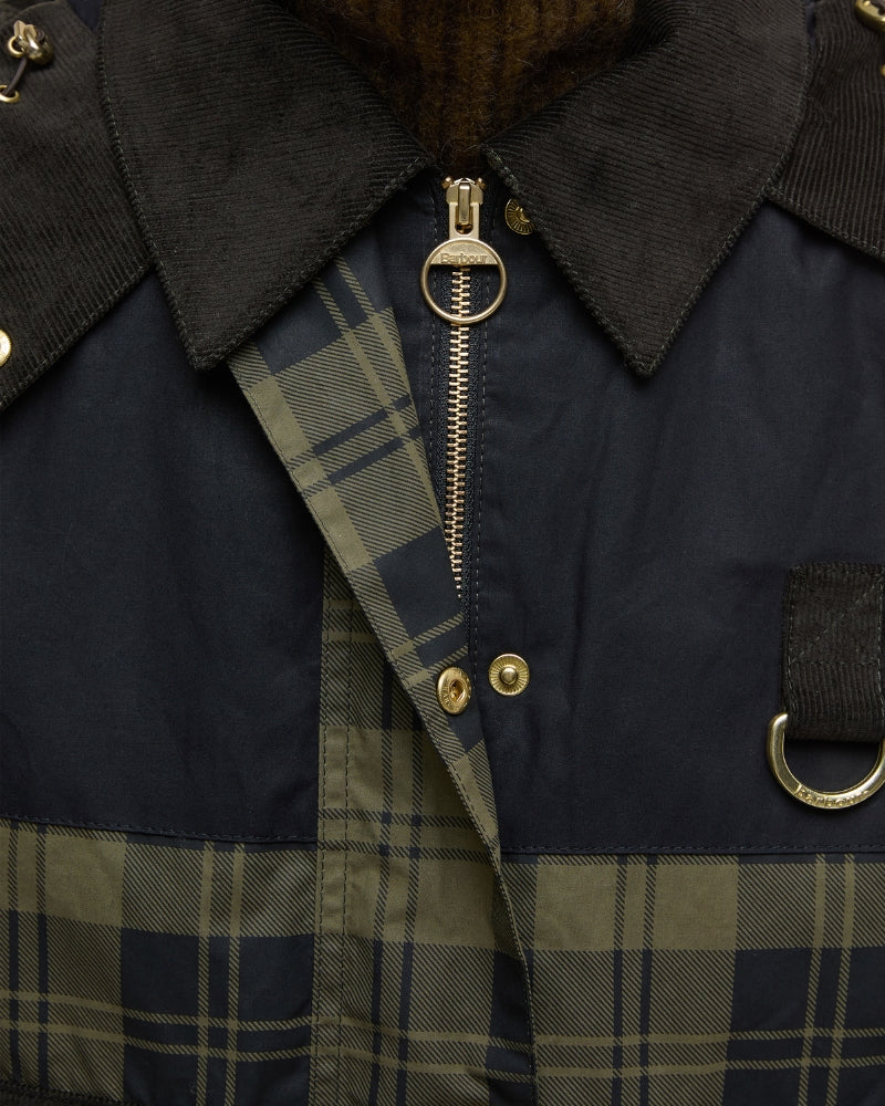 Detailed view of Barbour zip and popper fastening on the Elaine Sproof jacket