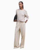 Lifestyle shot of Eleanor crew neck jumper styled with jeans for casual wear