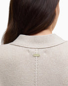 Back view of Barbour Faye cardigan with slim metal ID bar at neck
