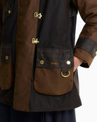 Barbour Felton Checked Wax Jacket in Dark Brown pocket detail