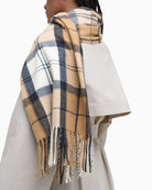 Barbour Hailes Tartan Scarf rolled on model's neck