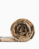 Rolled-up Barbour Hailes Tartan Scarf with tassel fringe detail