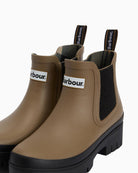 Detail shot of elasticated side gusset in black with subtle texture finish