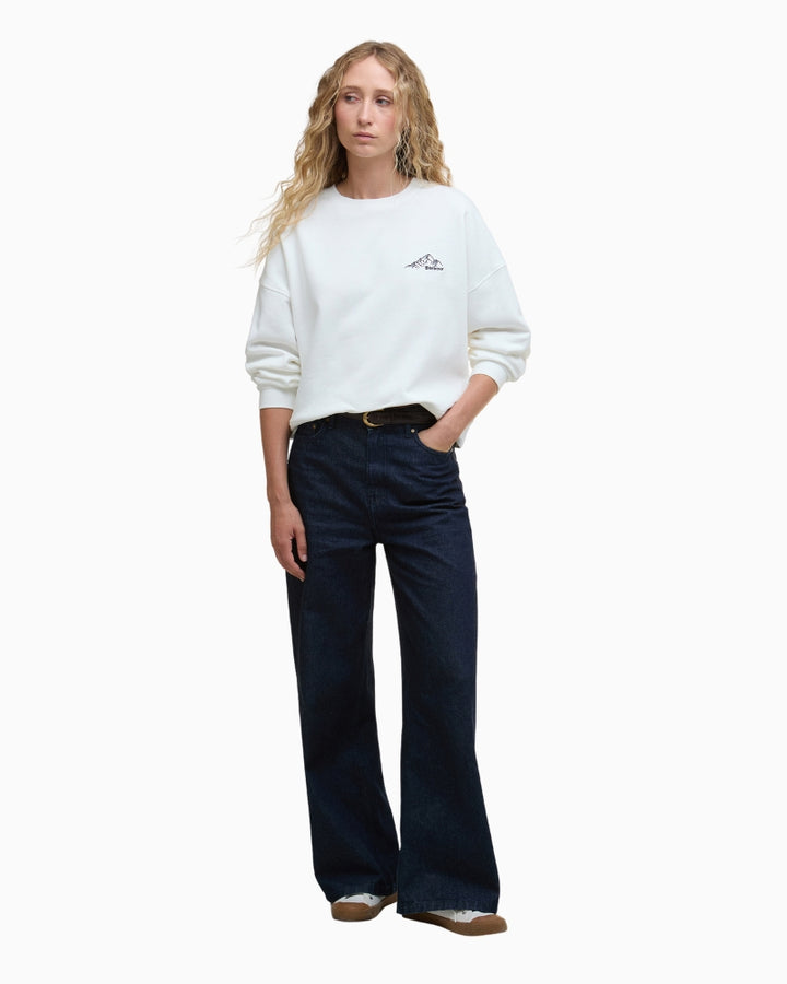 Model wearing sweatshirt with jeans – front angle