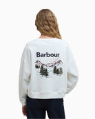 Rear view highlighting large scenic mountain embroidery