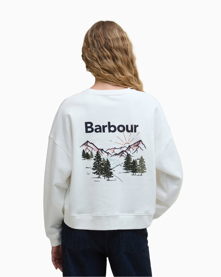 Rear view highlighting large scenic mountain embroidery
