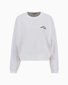 Flat lay view of off-white sweatshirt displaying design details