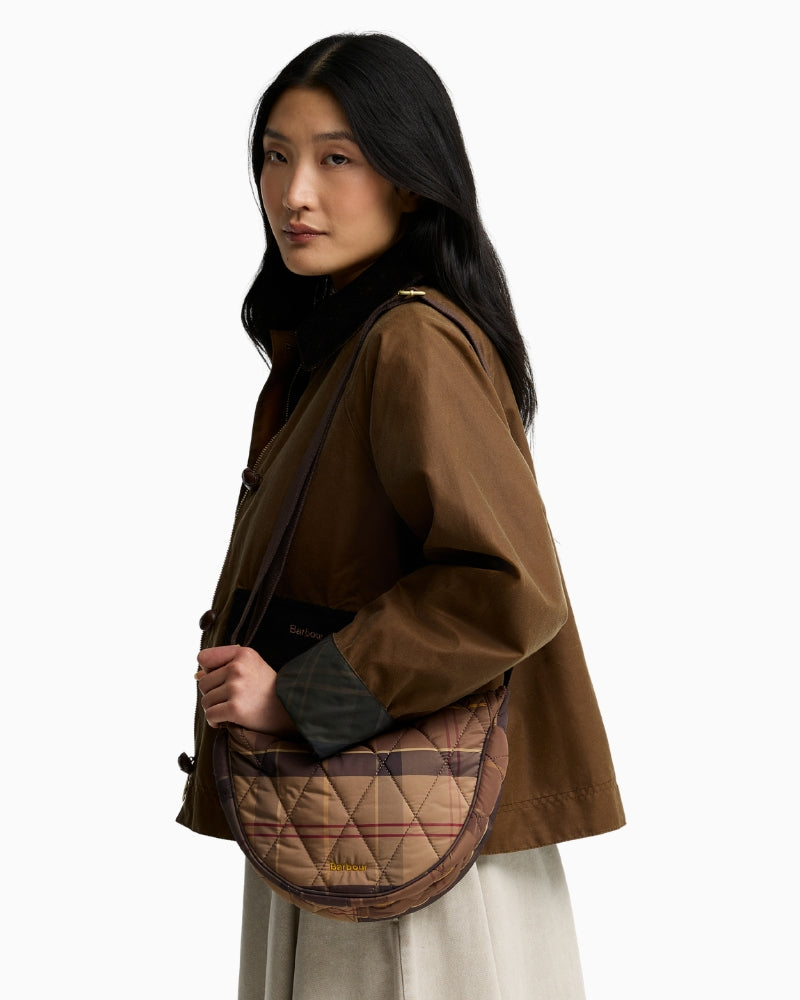 Barbour Healy Tartan Sling Bag in Tartan worn over the shoulder