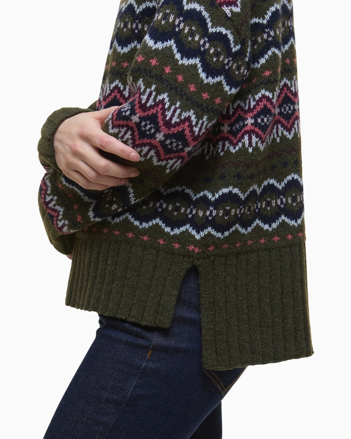 Side view of Barbour wool blend jumper showing relaxed fit and ribbed hem