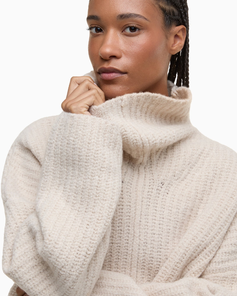 Close-up of pointelle knit detail on chest
