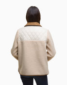 Back view of the beige Barbour fleece showing relaxed fit and trim