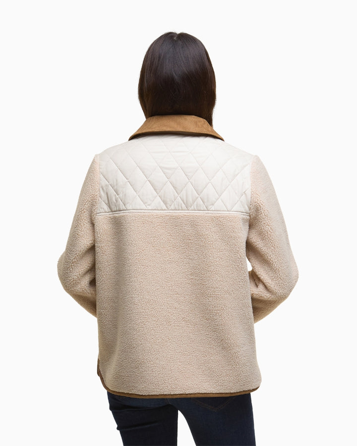 Back view of the beige Barbour fleece showing relaxed fit and trim
