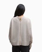 Back view showing unique zip detail and leather trim