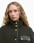 Close-up of collar and snap fastening detail