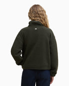 Back view of relaxed-fit fleece with subtle panel seams