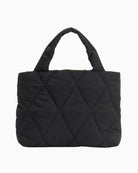 Back view of black Barbour quilted mini tote bag with smooth quilting and slim structured base