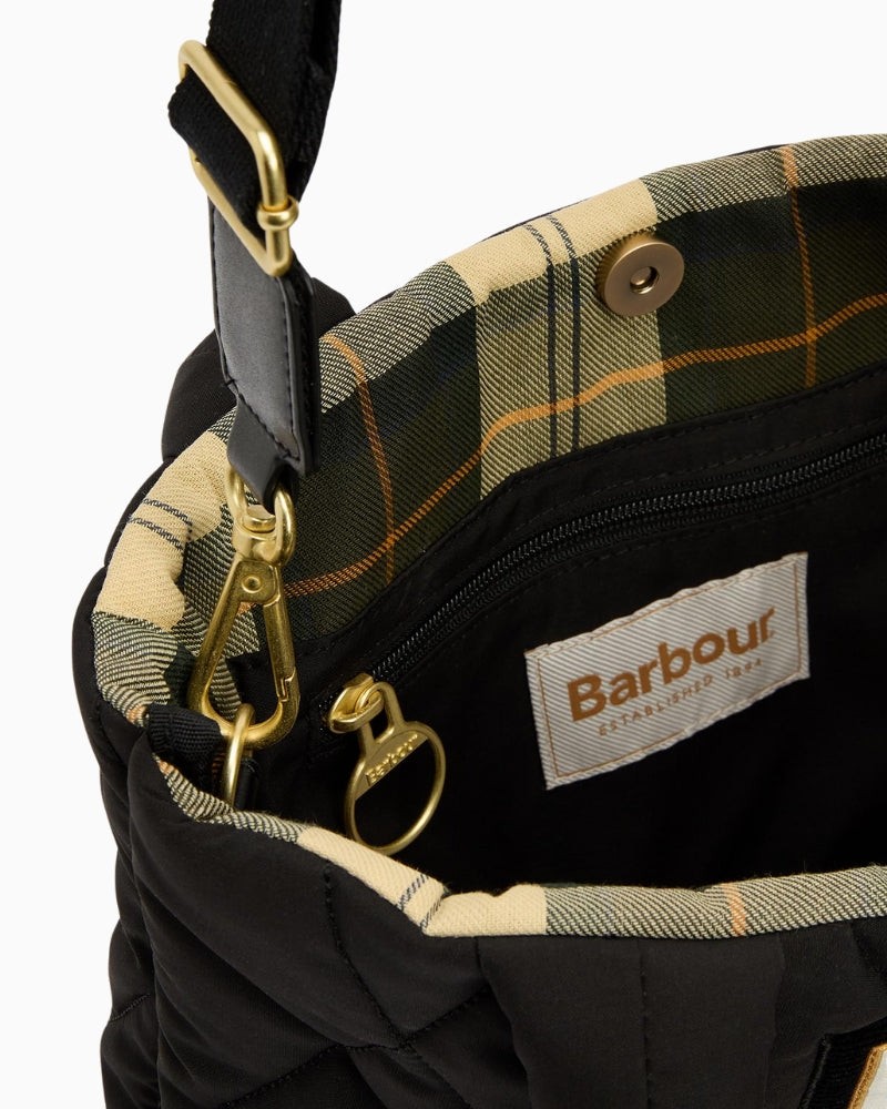Interior view of Barbour Mariah Quilted Mini Tote in black showing roomy lining and secure opening