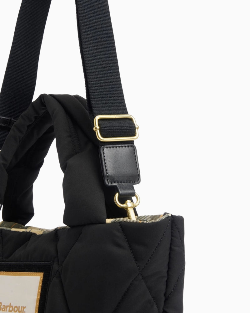 Closed-up view of Barbour Mariah Quilted Mini Tote strap with adjustable buckle