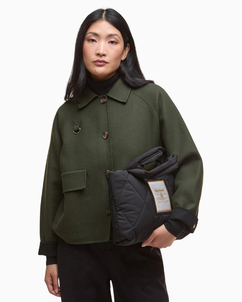 Lifestyle look of Barbour Mariah Quilted Mini Tote carried on hand