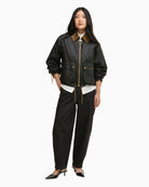 Woman wearing Barbour Marron wax jacket olive outdoor – Áines Boutique