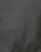 Barbour Marron wax jacket olive close up of fabric – Áines Boutique