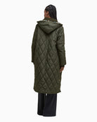 Back view showing fitted silhouette and quilted texture