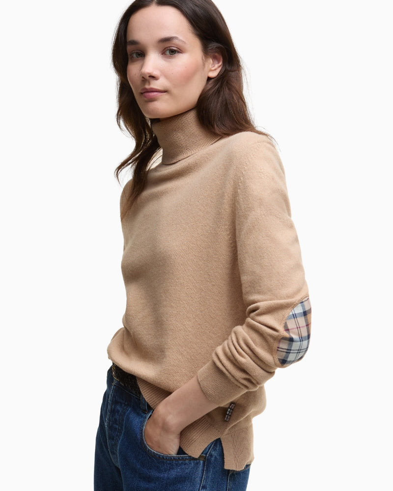 Side profile of Barbour wool-cotton jumper highlighting soft knit texture and long sleeves