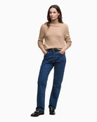 Model wearing Barbour Pendle Knit with jeans showing casual autumn layering look
