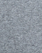 Fabric close-up of soft grey marl wool-cotton blend with visible knit texture