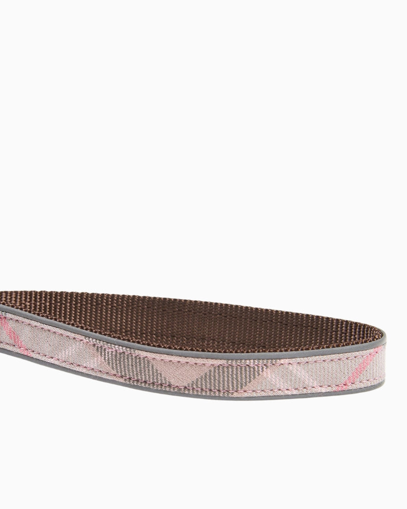 Handle view of Barbour reflective tartan dog lead in pink with padded loop