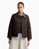 Barbour cropped quilted jacket dark brown front view tartan collar